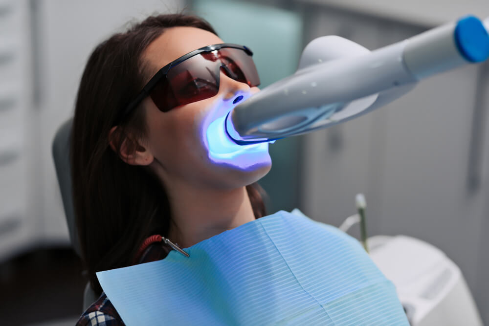 Teeth whitening procedure with ultraviolet light
